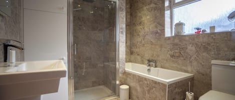 House, Multiple Beds | Bathroom | Separate tub and shower, hair dryer, towels