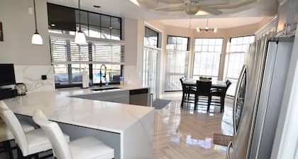 Villa Oasis, w/Heated & Covered Pool, Pool Table, Boat Dock, Gym and much more.