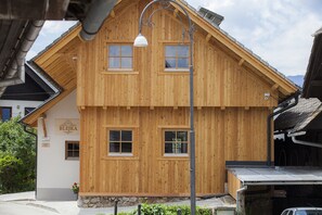 A wooden building with a sign reading "BLEJKA". - 1861 Blejka apartments (Bled)