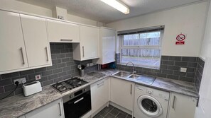 House, Multiple Beds | Private kitchen | Fridge, microwave, oven, stovetop