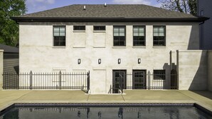 A two-story building with a swimming pool in front. - The Perfect Hideaway - Plan Your 30 Day Escape (Nashville)