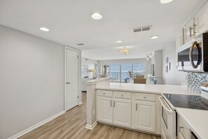 Condo, 3 Bedrooms | Private kitchen - Beach Cottage Look Condo, Ocean View from Spacious Balcony by RedAwning (Fernandina Beach)