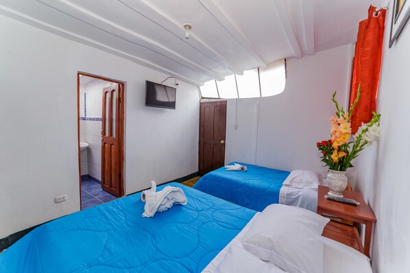 Classic Triple Room, 3 Twin Beds | Individually decorated, free WiFi - International Hostels (Cusco)