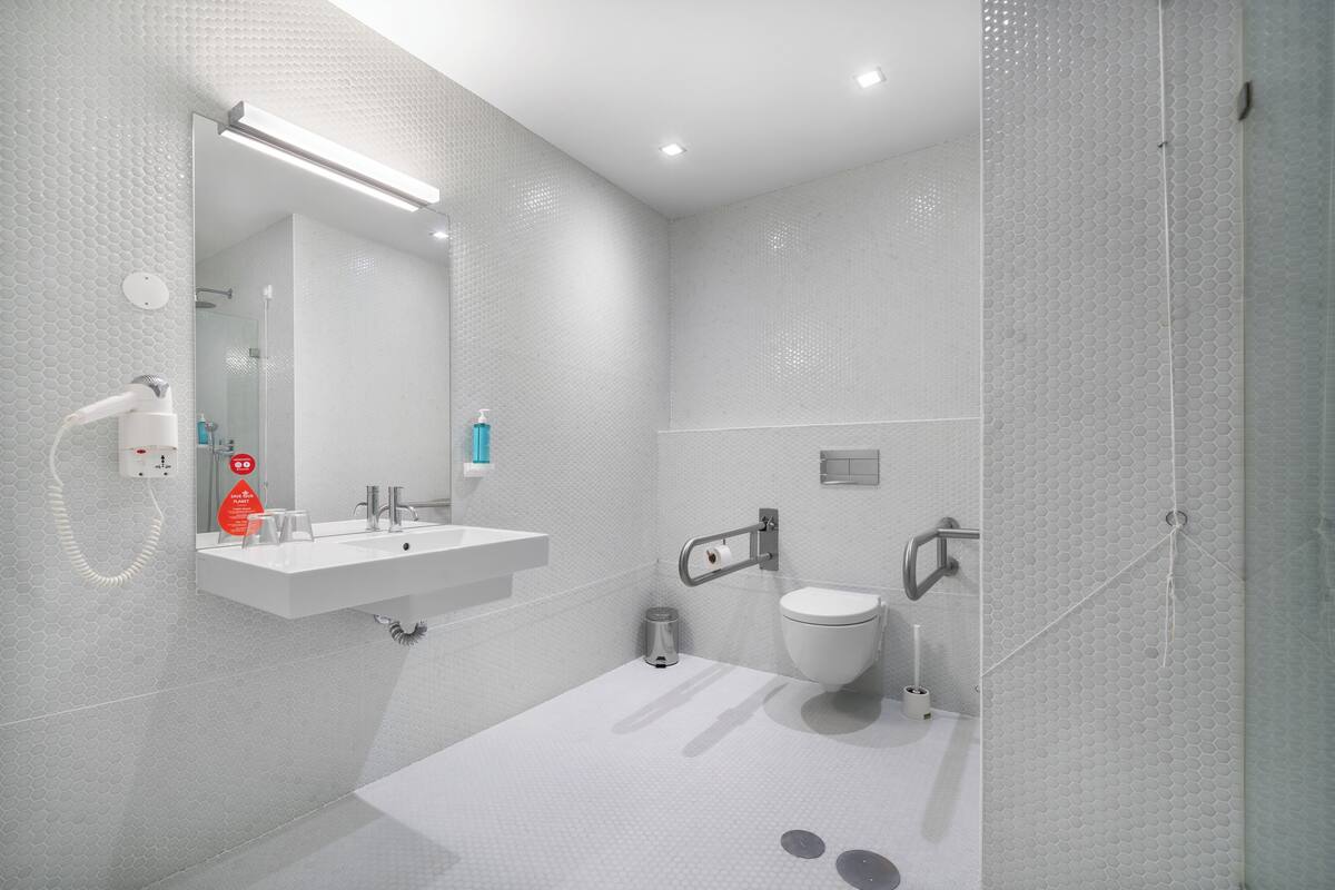 double room, 1 queen bed, accessible | bathroom | shower, hair dryer, towels, soap