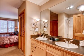 Combined shower/bathtub, hair dryer, towels, soap