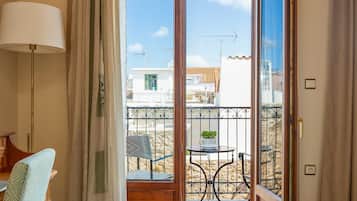 Dúplex superior, balcón, vista a la alberca | Vista desde la habitación