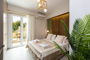 Apartment, 1 Bedroom, Partial Sea View | Desk, soundproofing, iron/ironing board, free WiFi - Vigla Suites (Rethymno)