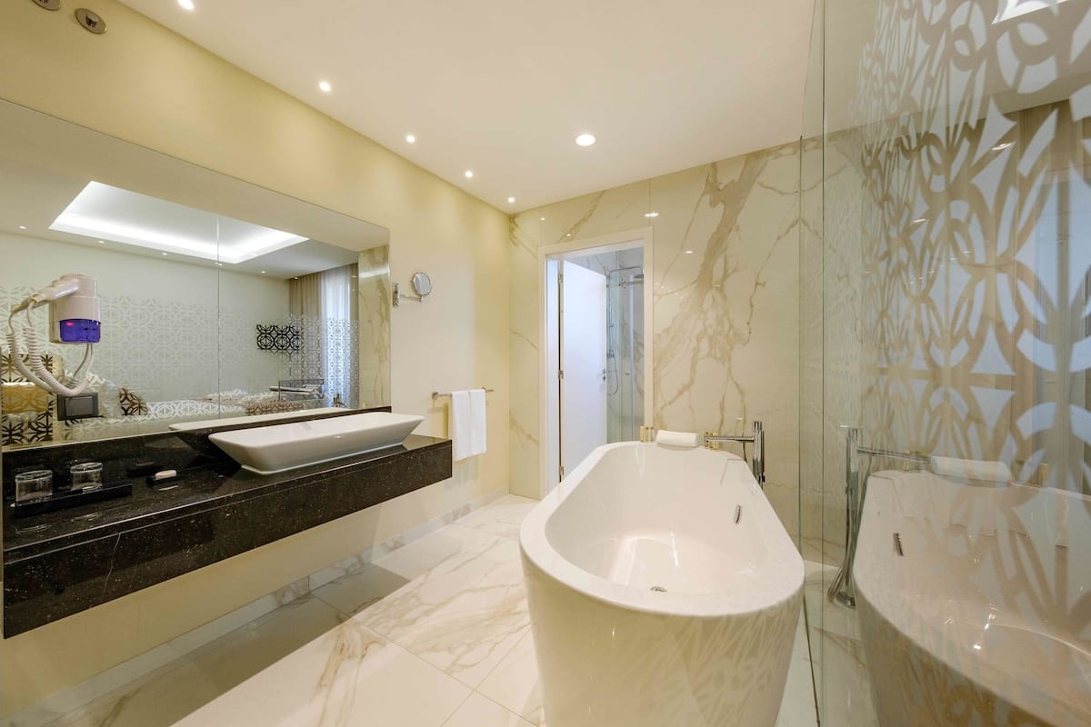 superior suite | bathroom | free toiletries, hair dryer, towels, soap