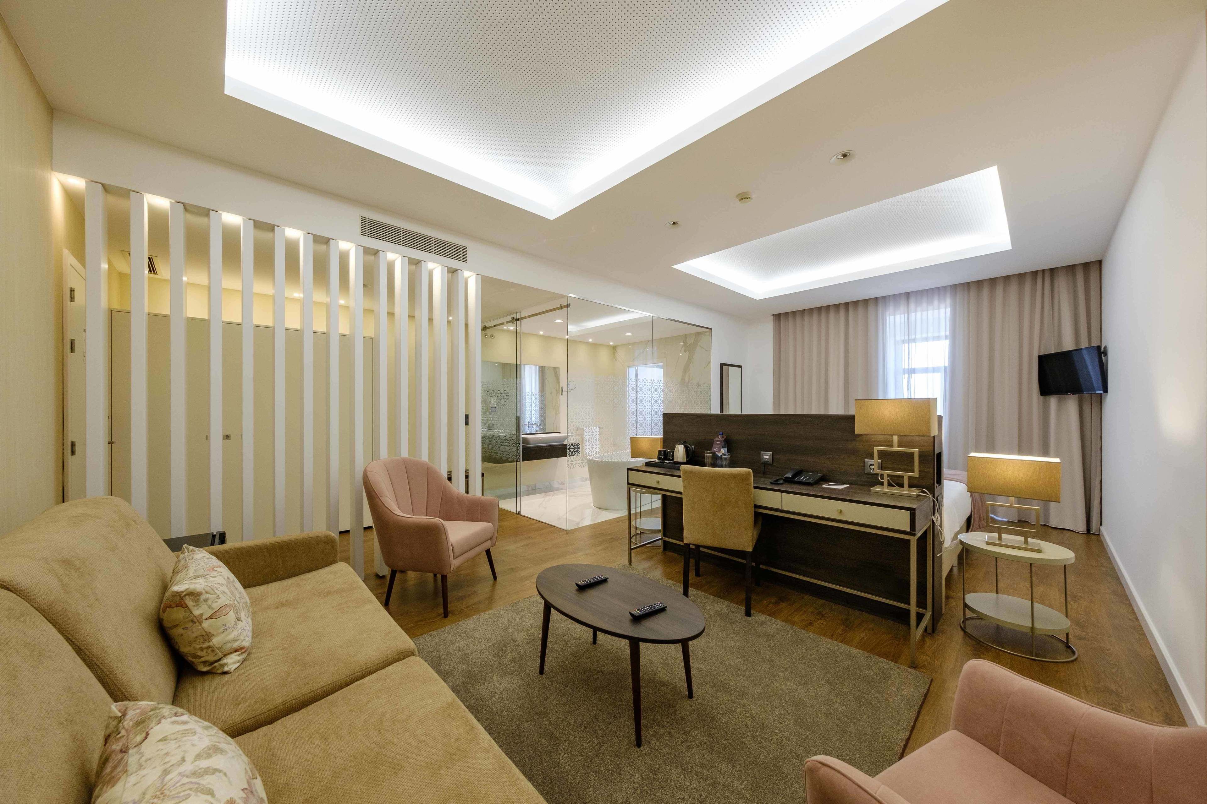 superior suite | living area | flat-screen tv