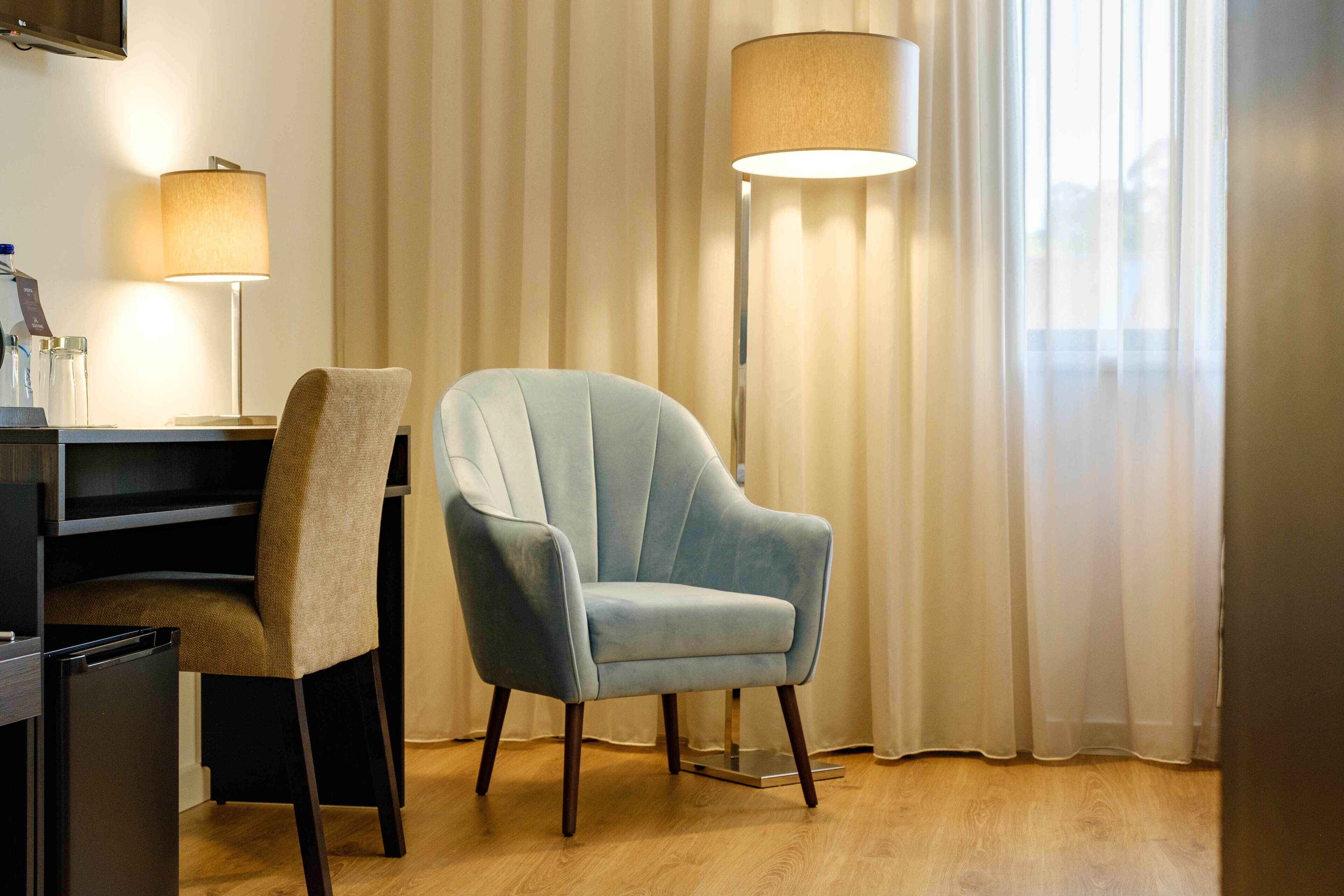 triple room | minibar, in-room safe, desk, blackout curtains