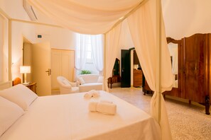 Premium bedding, down duvets, memory-foam beds, desk