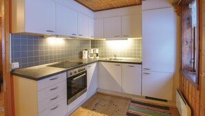 Coffee/tea maker, fridge, stovetop, dishwasher
