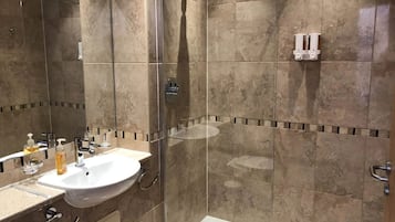 Shower, free toiletries, hair dryer, towels