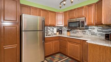 Premium Studio, Ocean View | Private kitchen | Full-sized fridge, microwave, stovetop, coffee/tea maker
