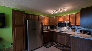 Premium Studio, Ocean View | Private kitchen | Full-sized fridge, microwave, stovetop, coffee/tea maker