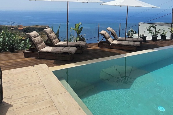 Outdoor pool, open 9:00 AM to 9:00 PM, sun loungers