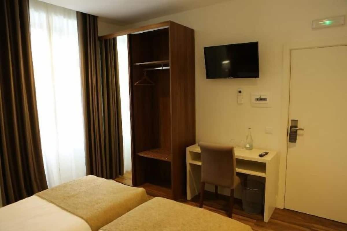 1 dormitori i caixa forta a l'habitació