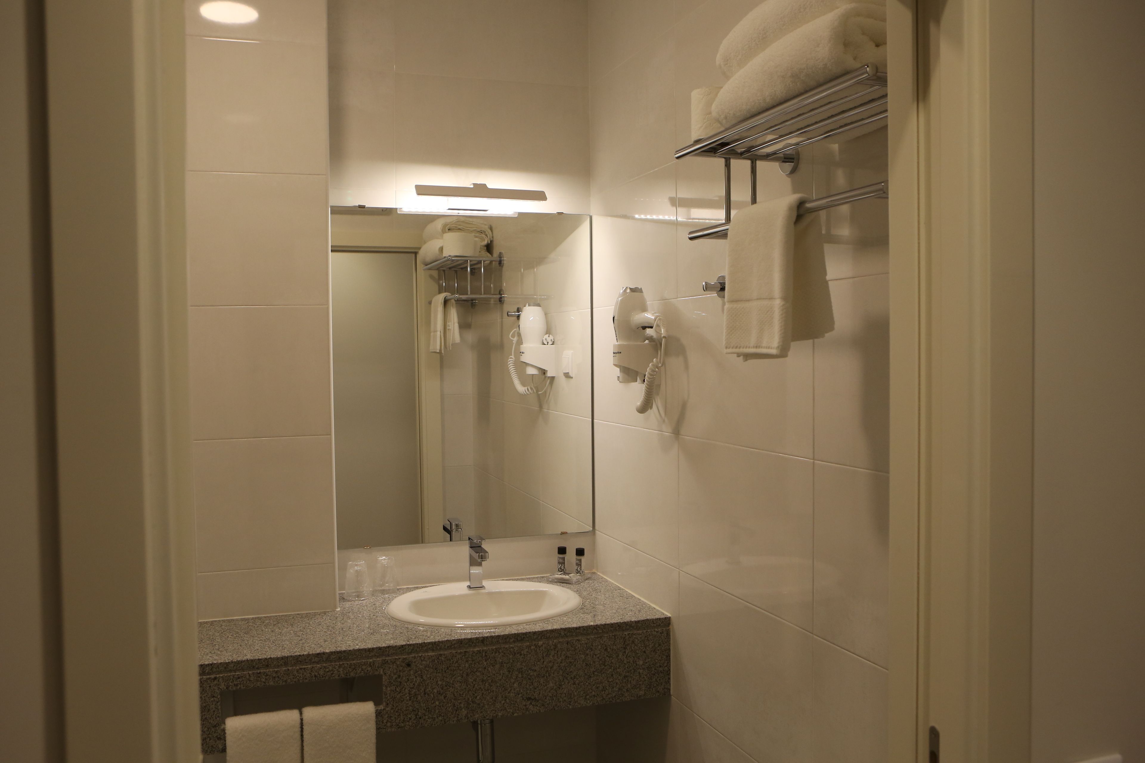 standard double or twin room | bathroom | shower, hair dryer, towels, soap