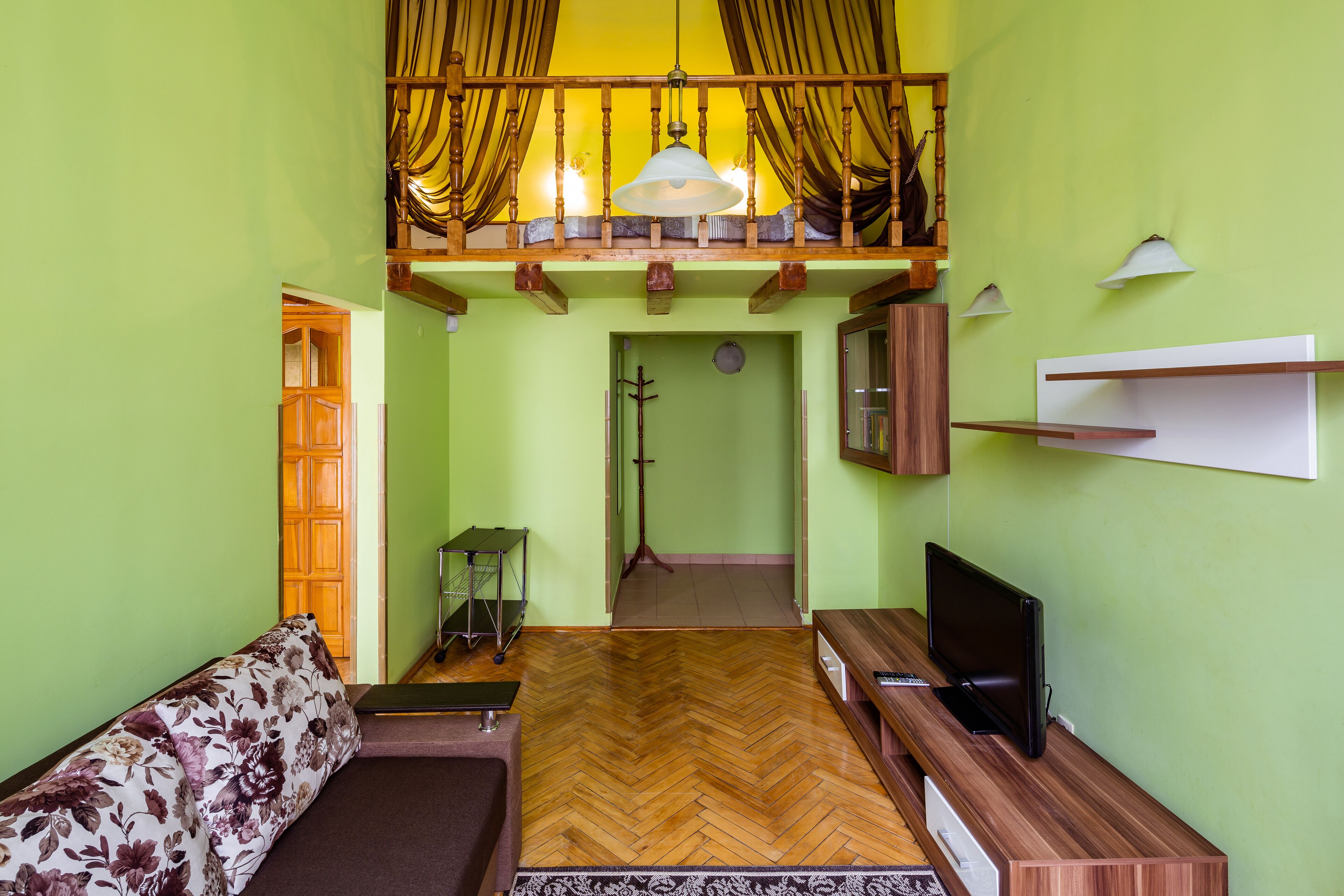 Apartment, 1 Bedroom | Living room | Flat-screen TV