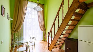 Apartment, 1 Bedroom | Living room | Flat-screen TV