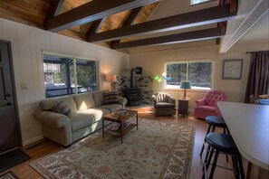 Cabin, Multiple Beds, Fireplace | Living area | 40-inch flat-screen TV with cable channels, TV, fireplace - Cozy Cabin (South Lake Tahoe)