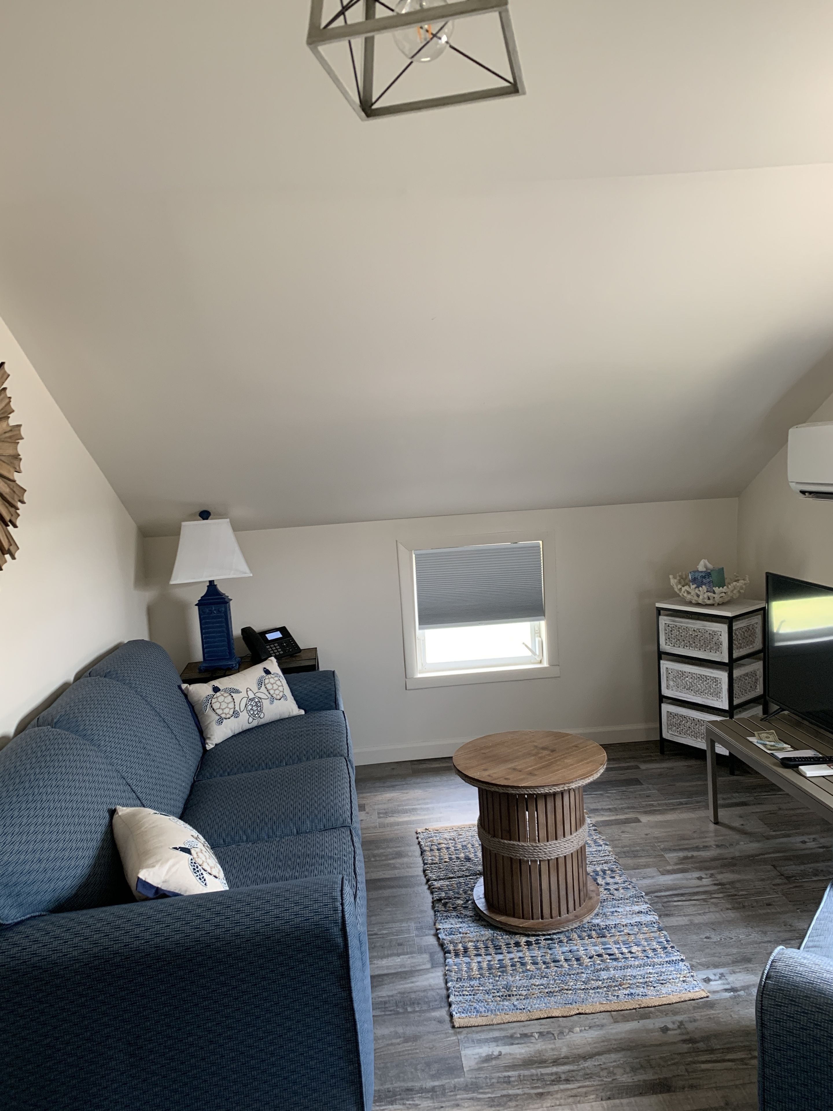 standard cottage, multiple beds, non smoking (family cottage) | living room | 32-inch flat-screen tv with cable channels, tv, ipod dock