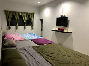 Family Room, Multiple Beds, 2 Bathrooms | Blackout drapes, free WiFi, bed sheets, wheelchair access
