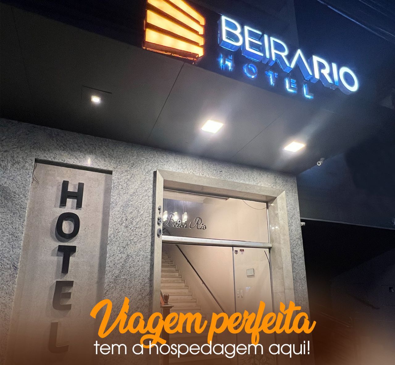 The exterior of Beirario Hotel with a sign indicating it is a hotel.