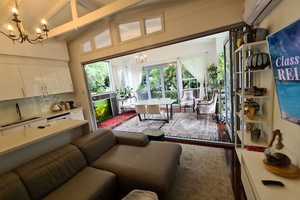 conservatory + Kitchen and living area.