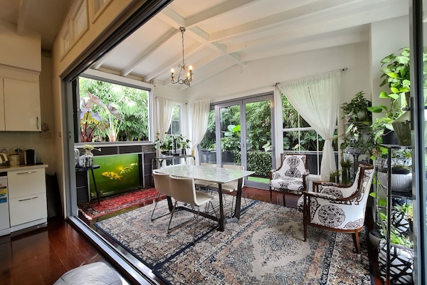 conservatory + Kitchen and living area.