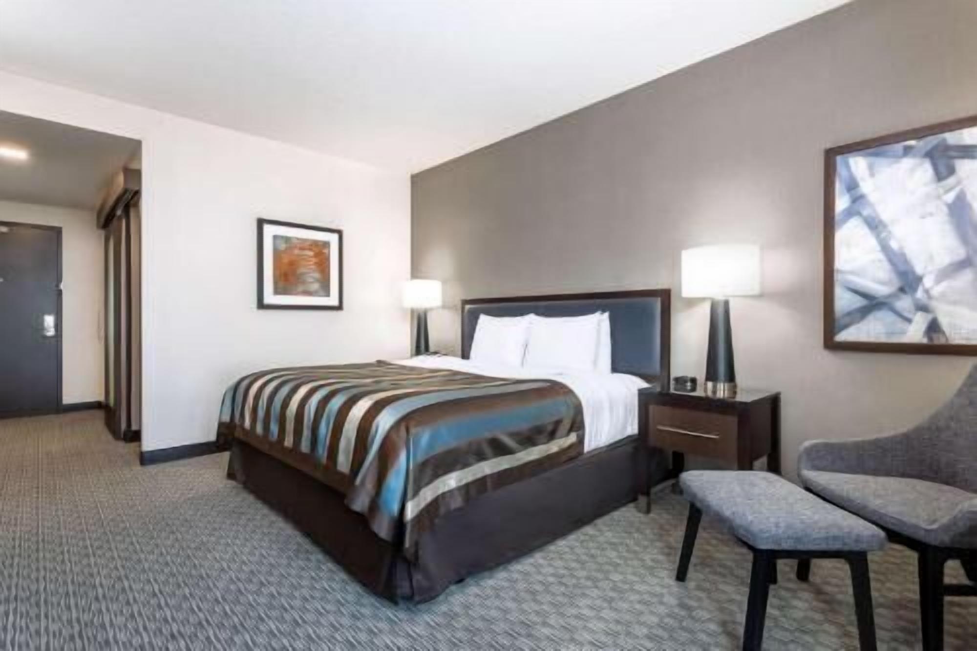 Premium bedding, pillow-top beds, desk, blackout curtains