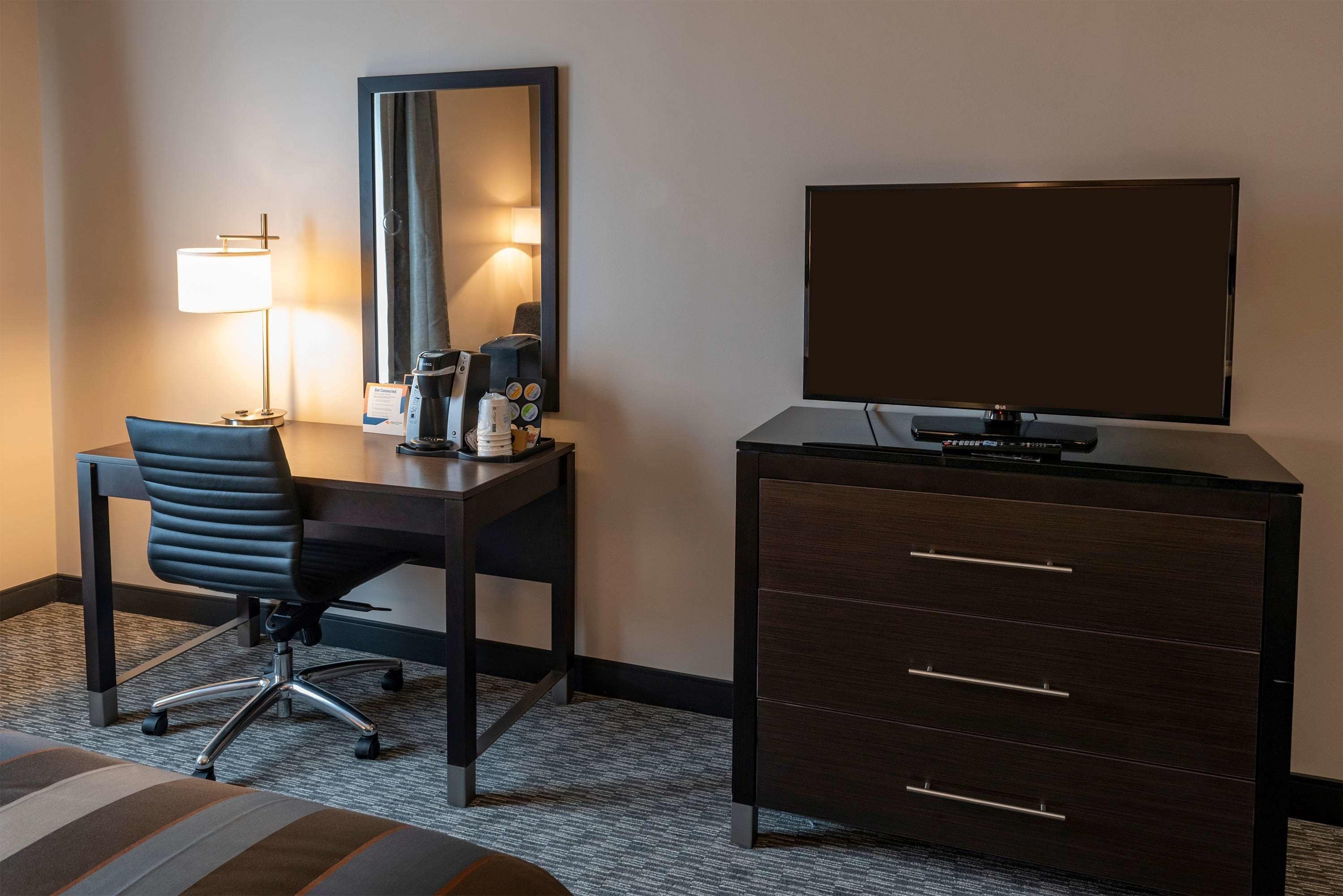 premium bedding, pillow-top beds, desk, blackout curtains