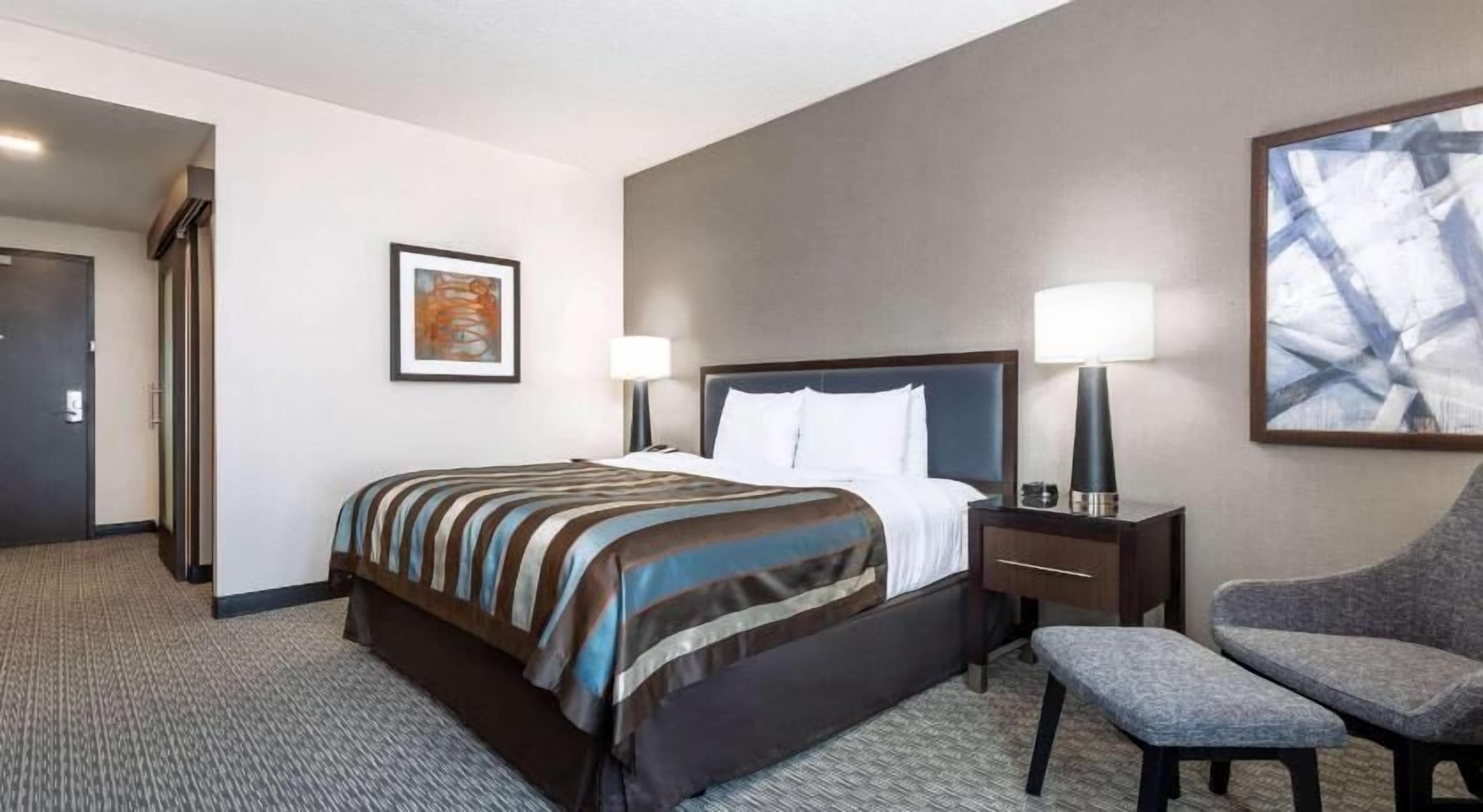 Premium bedding, pillow-top beds, desk, blackout curtains