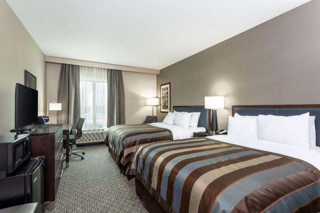 Premium bedding, pillow-top beds, desk, blackout curtains