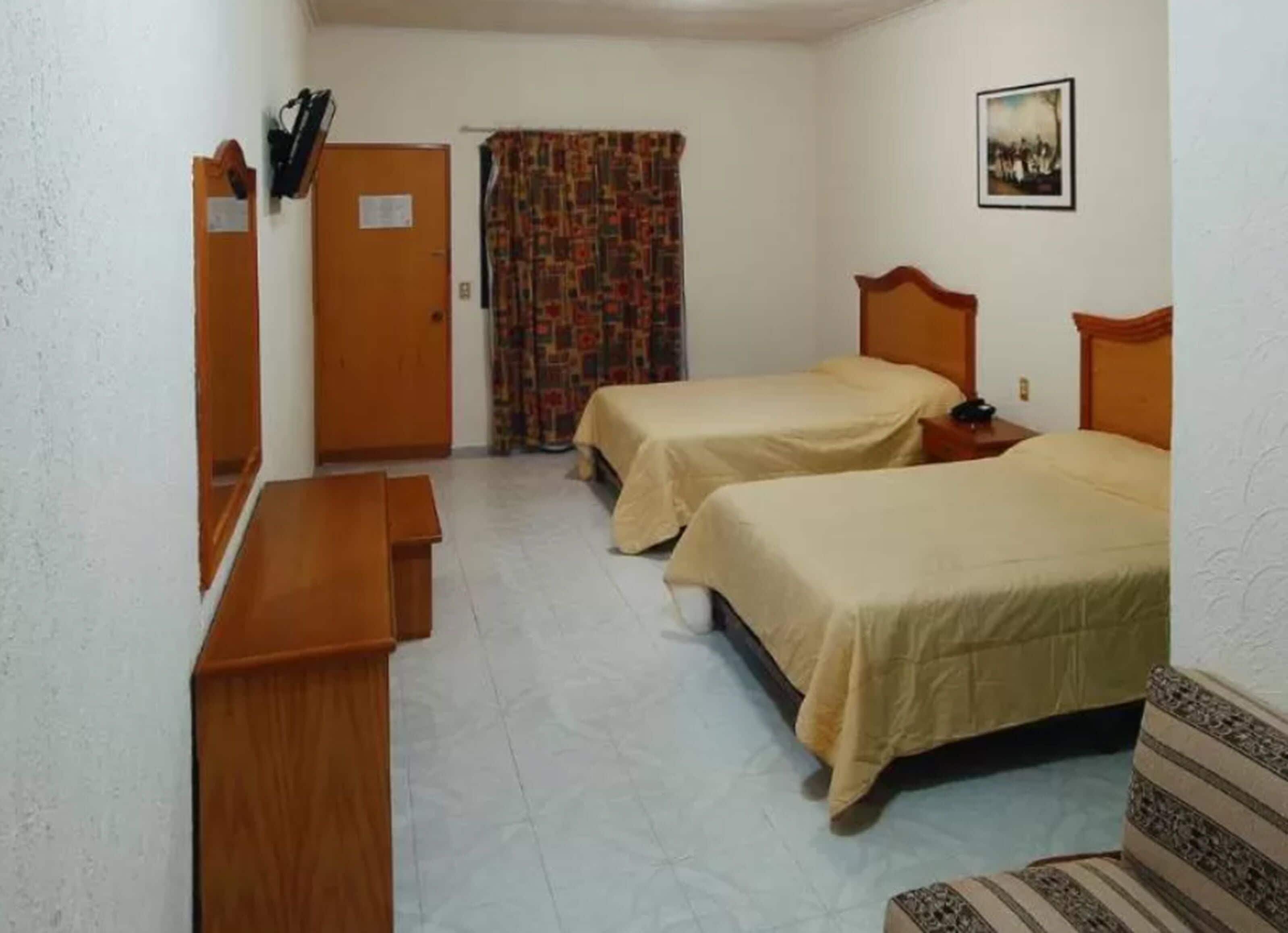 standard room, 2 double beds | in-room safe, iron/ironing board, free wifi, bed sheets