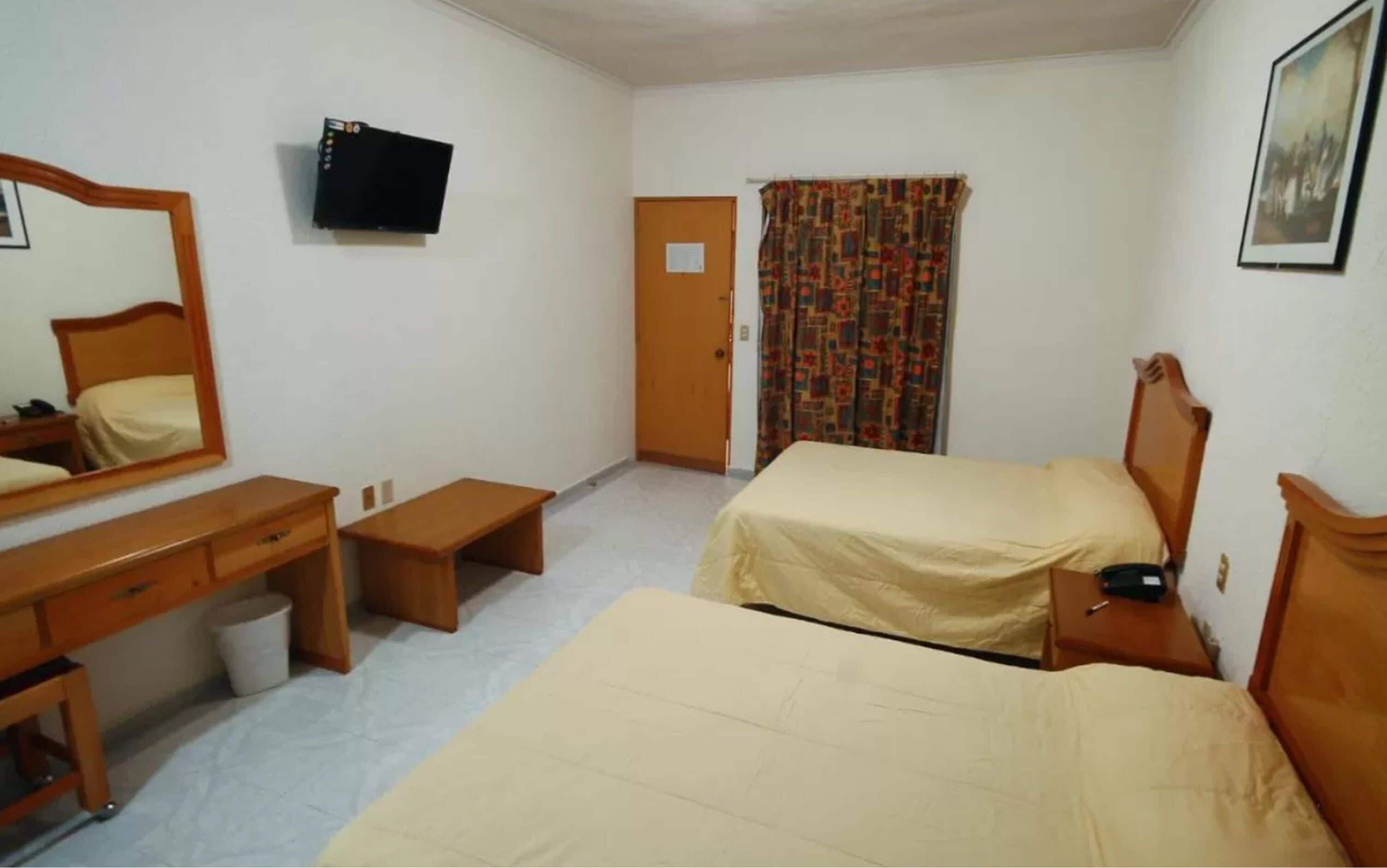 standard room, 2 double beds | in-room safe, iron/ironing board, free wifi, bed sheets
