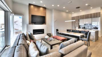 Apex Three Bedroom Townhome | Living area | 50-inch Smart TV with satellite channels, TV, fireplace