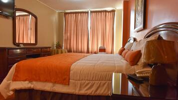 Suite, 1 Queen Bed | Desk, iron/ironing board, free WiFi, bed sheets