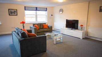 Apartment, 2 Bedrooms | Living area | Flat-screen TV