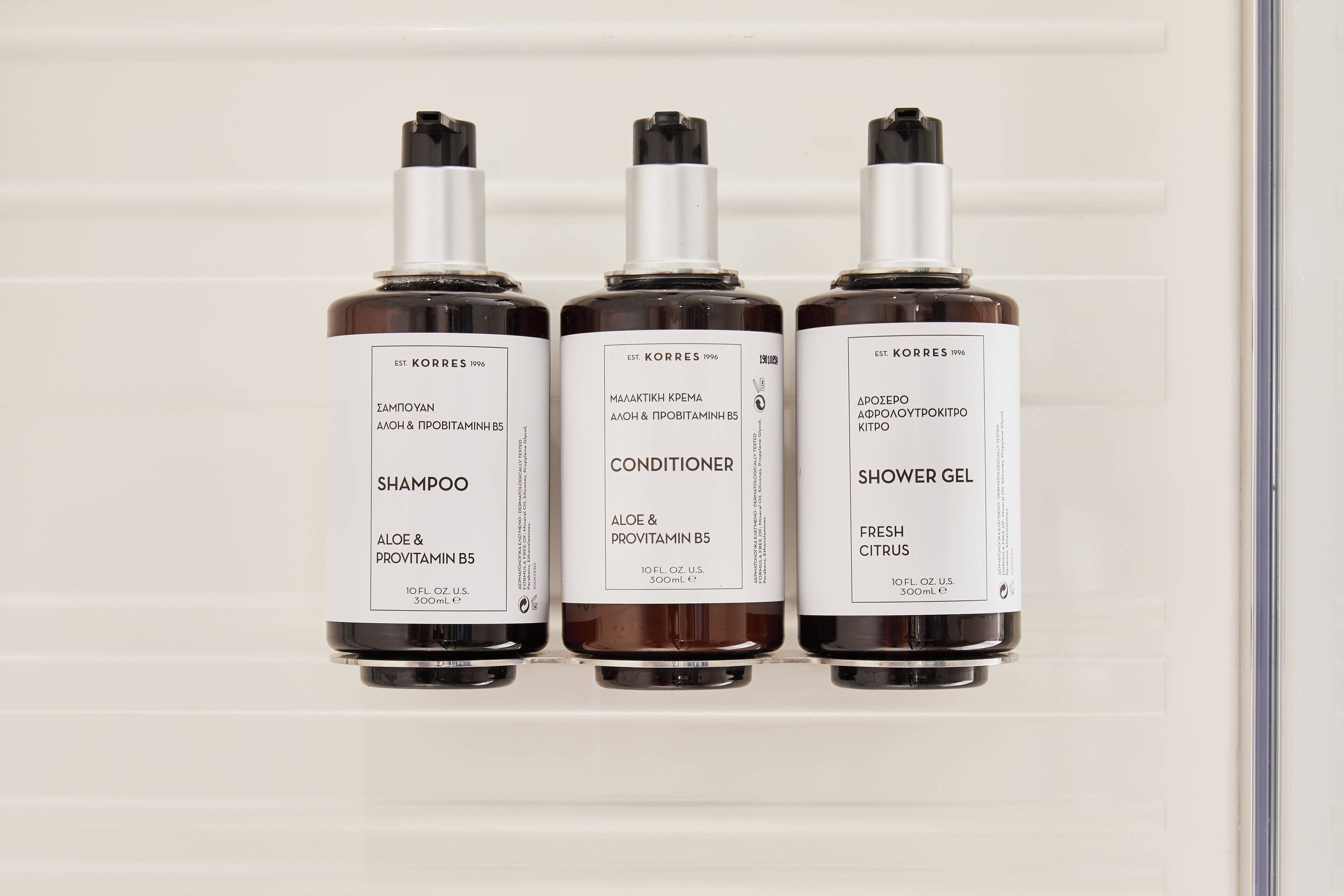 rainfall showerhead, designer toiletries, hair dryer, towels