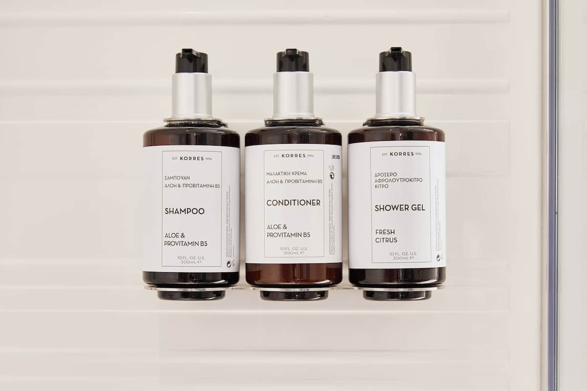 rainfall showerhead, designer toiletries, hair dryer, towels