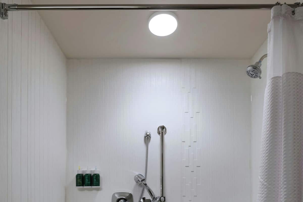 Designer toiletries, hair dryer, towels, soap