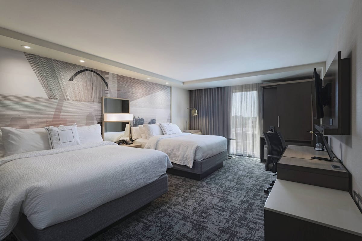 Premium bedding, down comforters, pillowtop beds, in-room safe