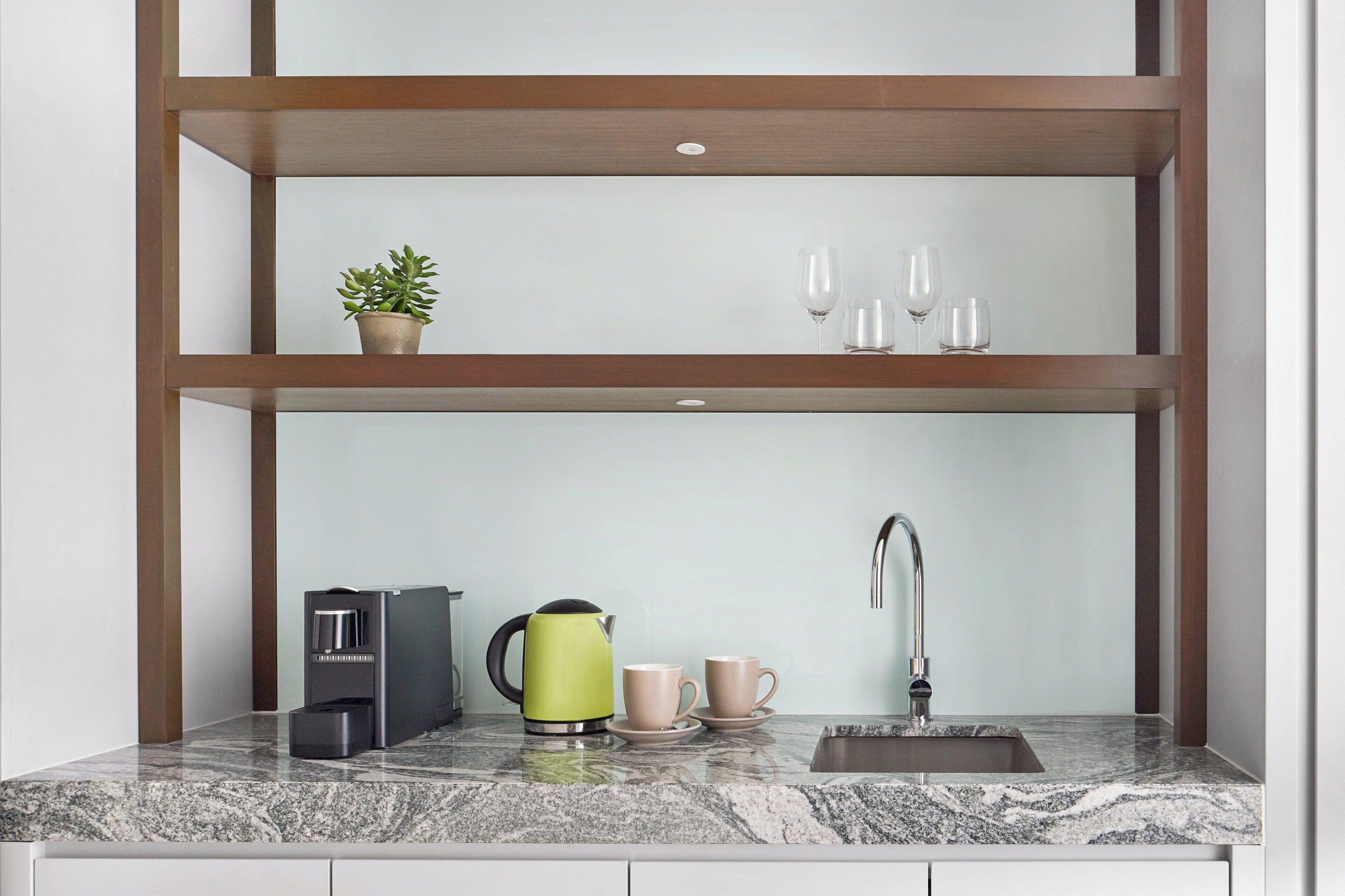 mini-fridge, espresso maker, coffee/tea maker, electric kettle