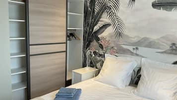 2 slaapkamers, een strijkplank/strijkijzer, reisbedje, gratis wifi