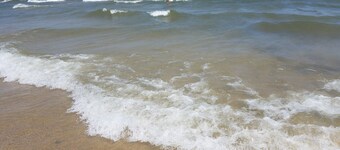 Family owned vacation suite conveniently located across from Lake Huron beach.