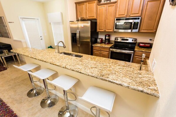 Townhome, 5 Bedrooms | Private kitchen