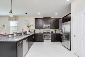 Casa, varias camas | Cocina privada