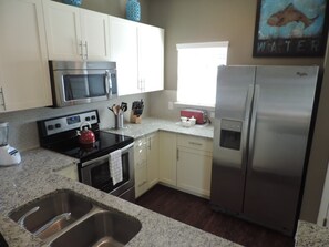 Townhome, 4 Bedrooms | Private kitchen