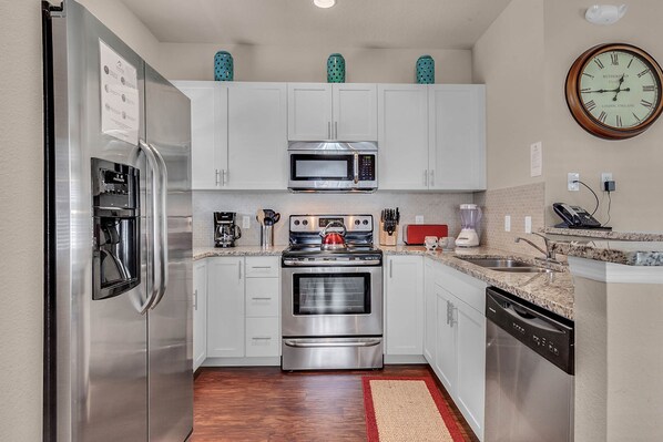 Townhome, 4 Bedrooms | Private kitchen | Fridge, oven, highchair